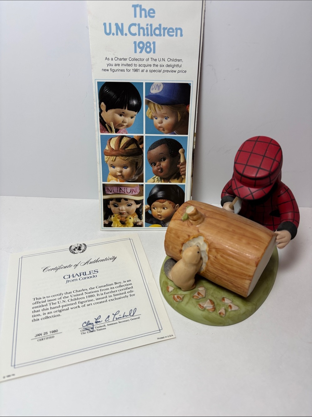 Franklin Mint Charles from Canada.  Chopping wood.